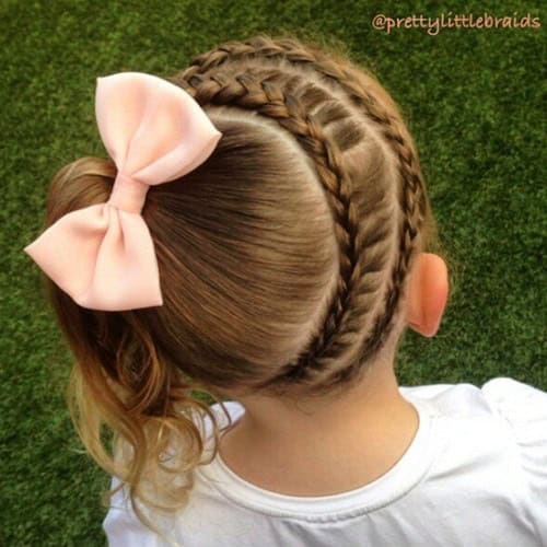 Two-sided French braid with side ponytail and big bow