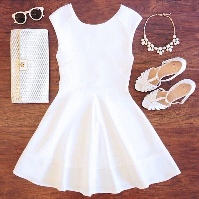 Black-and-white dress and brown accessories