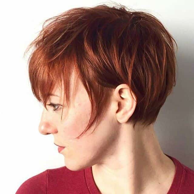 Long pixie with long layer bangs and sideburns