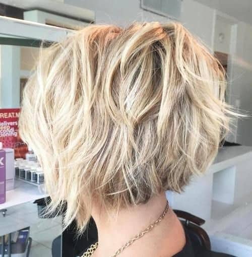 Blonde Bob with Tousled Layers – Layered curly bob haircut for short hair