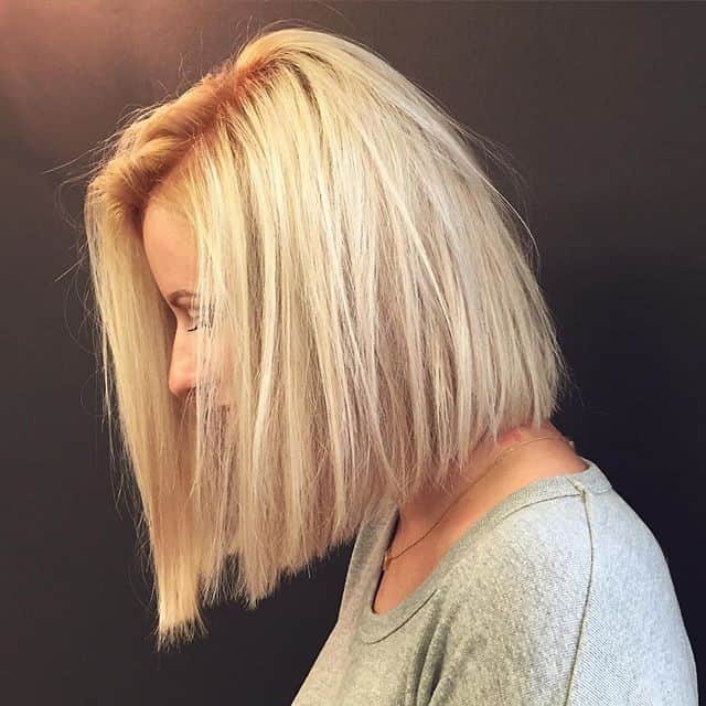 “Messy” platinum lob with natural roots