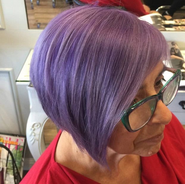 Purple inverted bob with side-swept bang