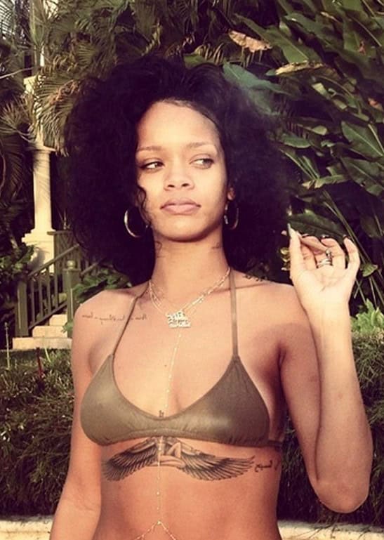 Rihanna Latest Hairstyles 2014 – medium black curly hairstyle