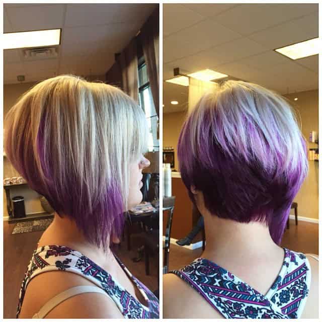 A-line angled bob with platinum and purple and a tapered neckline and bangs