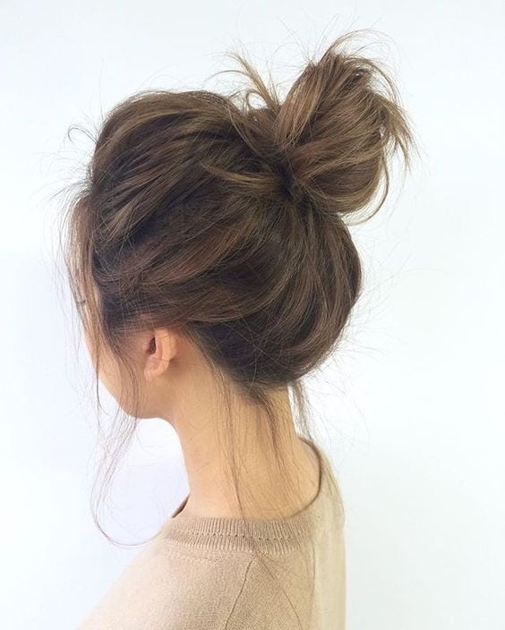 High Bun with Loose Strands