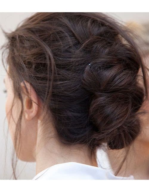 “Messy” French twist with multi-knots