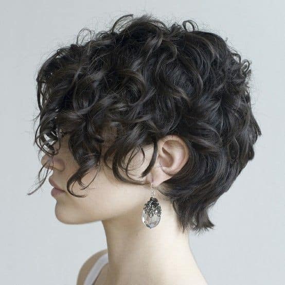 Trendy short curly pixie haircut for women