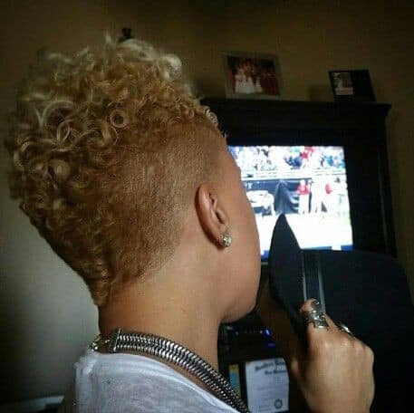 Cute and curly short blonde Mohawk