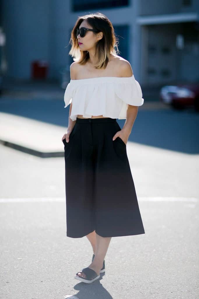 White top with a black flare skirt