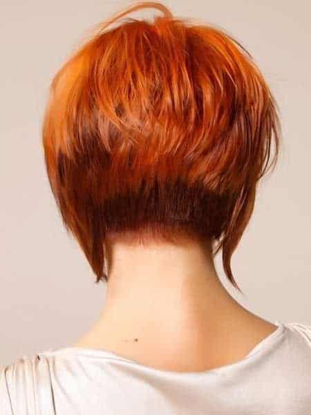 Tapered in back red bob