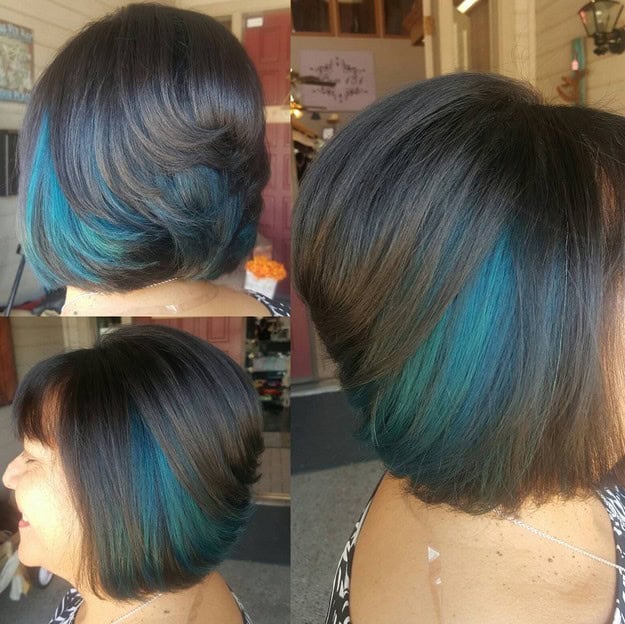 Stacked bob with short bangs and teal chunks of color