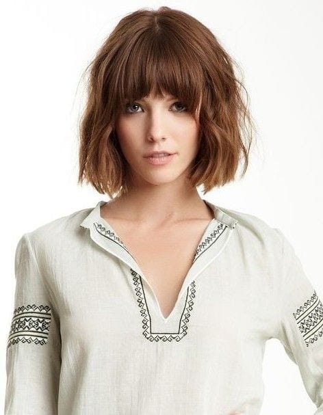 Wavy bob with bangs and middle part