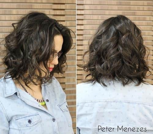 Dark brown wavy lob with “messy” middle part