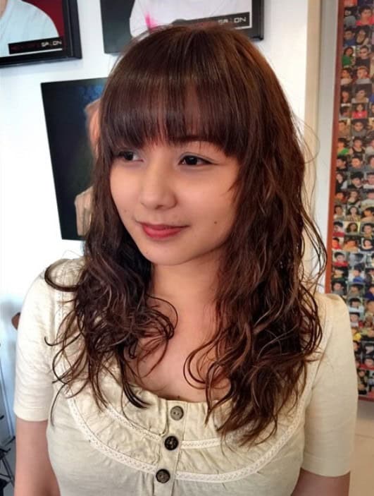 Loose perm with bangs