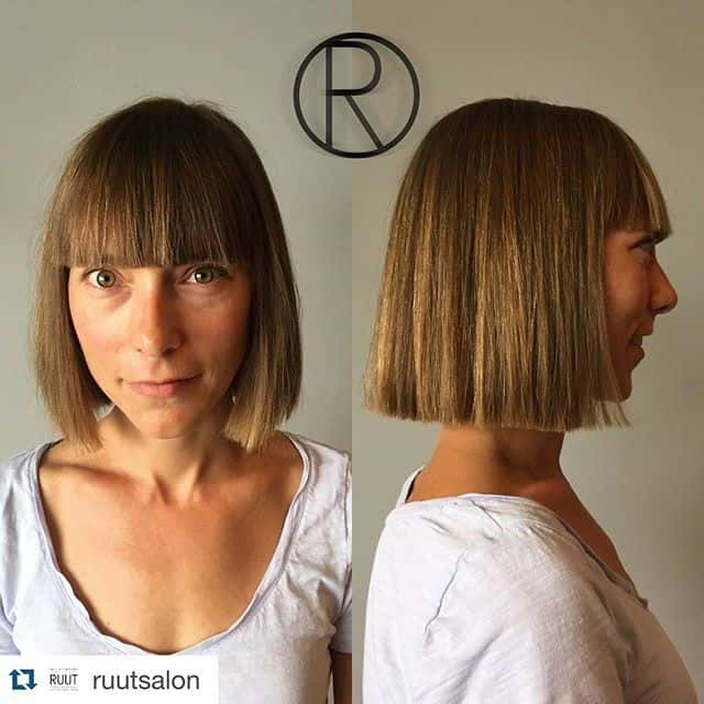 Light brown super straight blunt bob with bangs