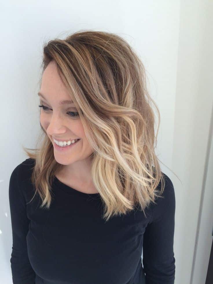 Nice and wavy lob with platinum highlights for thick hair