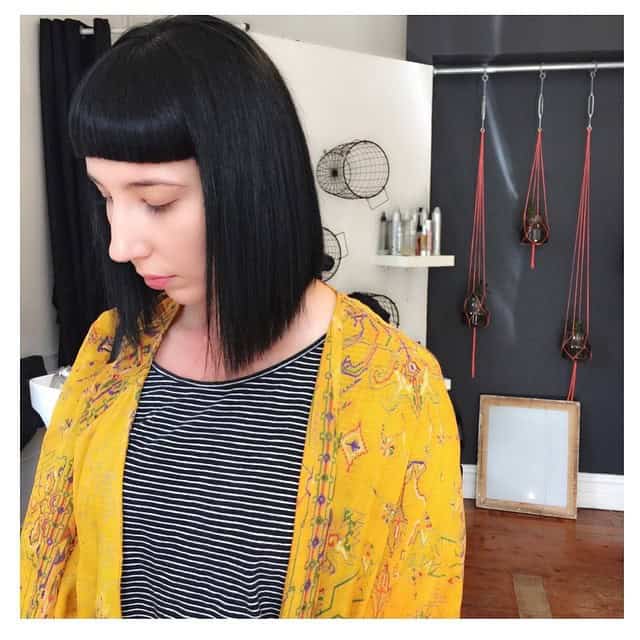 Jet black bone straight lob with short blunt bangs