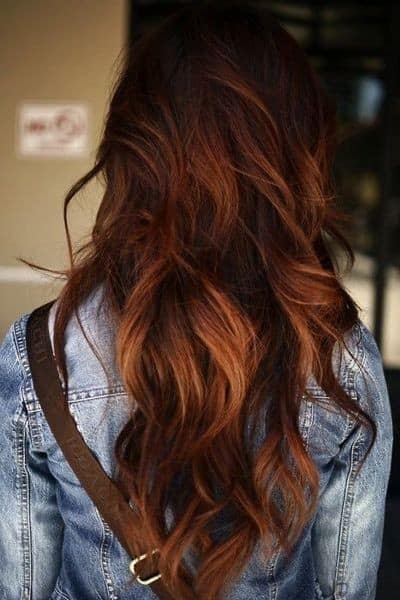 Long wavy hair with dark highlights