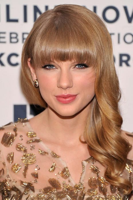 Taylor Swift Long Curls with Bangs – Romantic long wavy hairstyle with blunt bangs