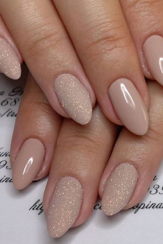 Glossy and Sparkly Nude Nails