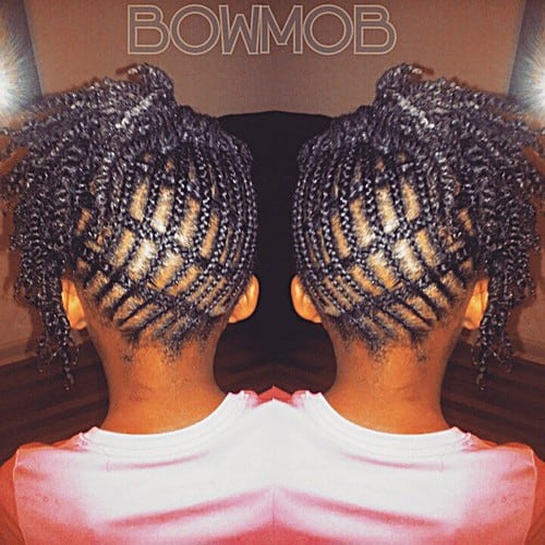 Cornrows and twists side updo