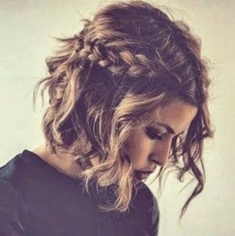 Wavy A-line bob with middle part and two-braid “headband”