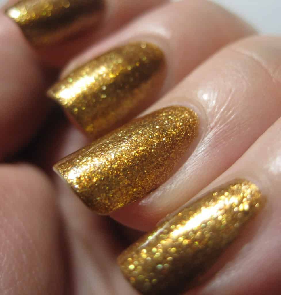 Gold nail polish