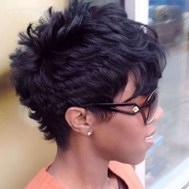 Wavy and curly pixie with tapered sides