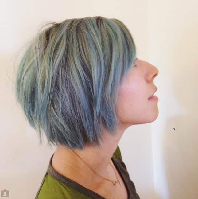 Blue and green short choppy bob with side-swept bangs