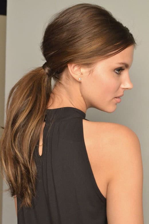 Long locks with a low ponytail and knot