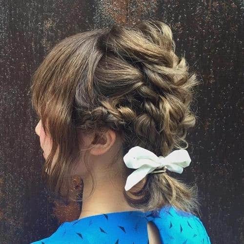 Elaborate Braided Ponytail with Bow