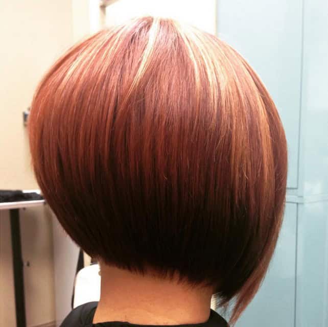 Graduated bob for thick hair with brown layers and blonde highlights