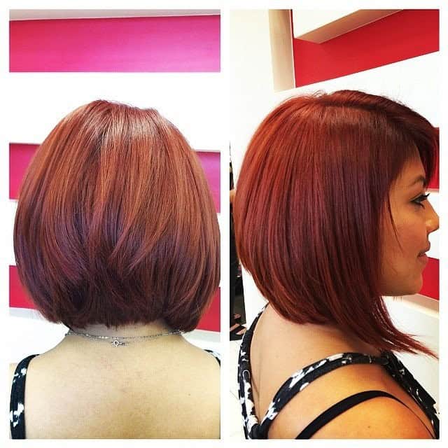 Deep red angled bob with longer front for thick hair