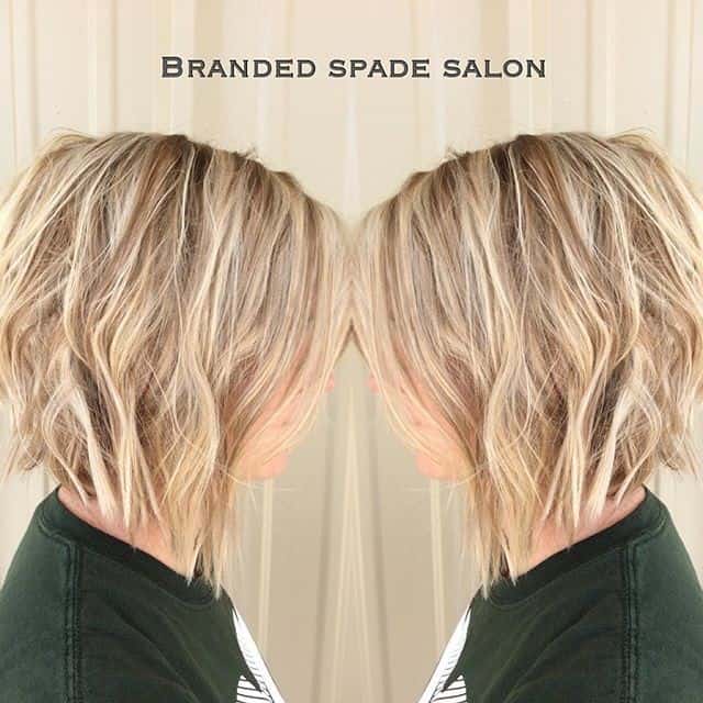 Messy blonde and light brown wavy angled bob