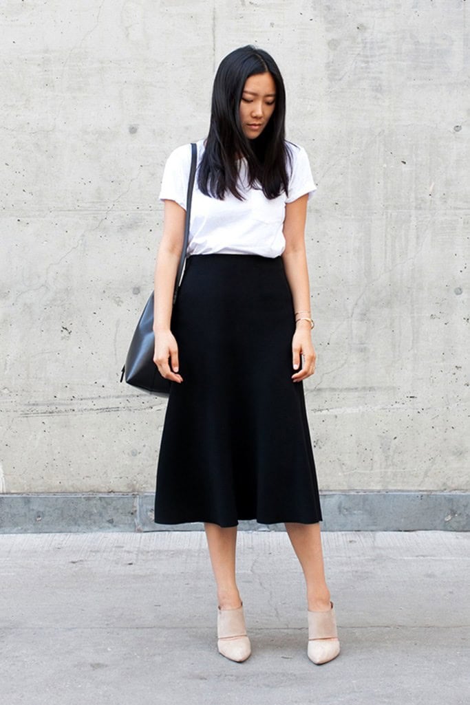 White top with a black flare skirt