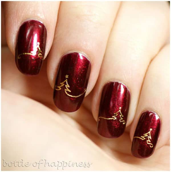 Trendy Crimson Nails with Golden Christmas Tree