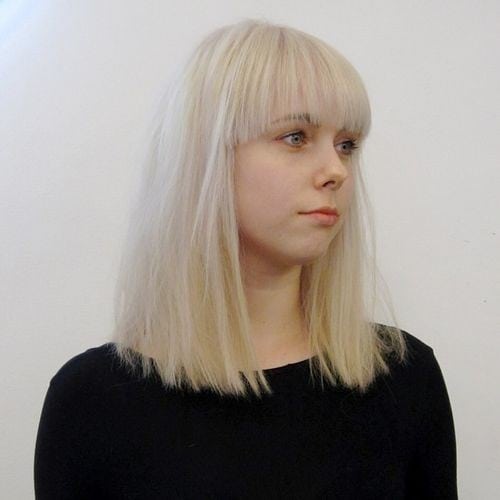 Blonde Straight Haircut with Bangs