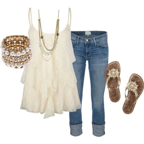 White lace ruffled top, jeans and jewels