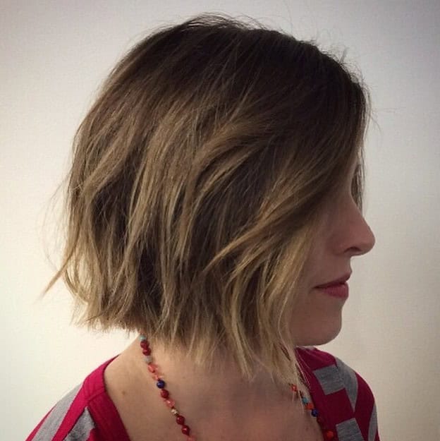 Choppy bob with”barely there” waves with highlighted front and side part