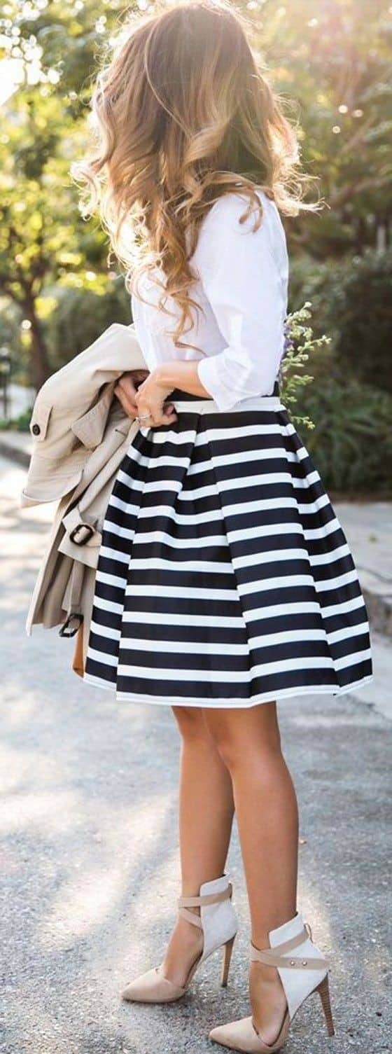 White top with a black flare skirt