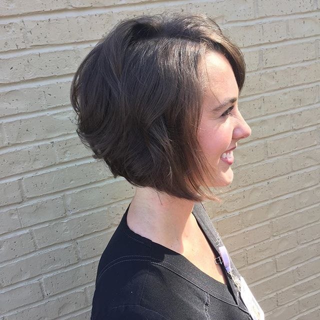 Wavy and bouncy angled bob for women over 50