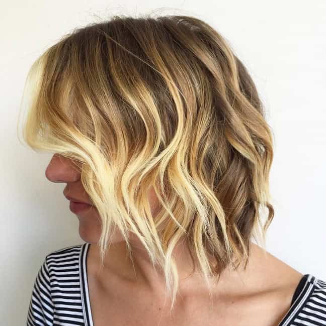 Wavy choppy bob with platinum highlights and “random” layers