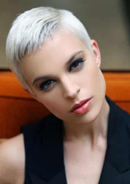 Super short pixie cut with side part