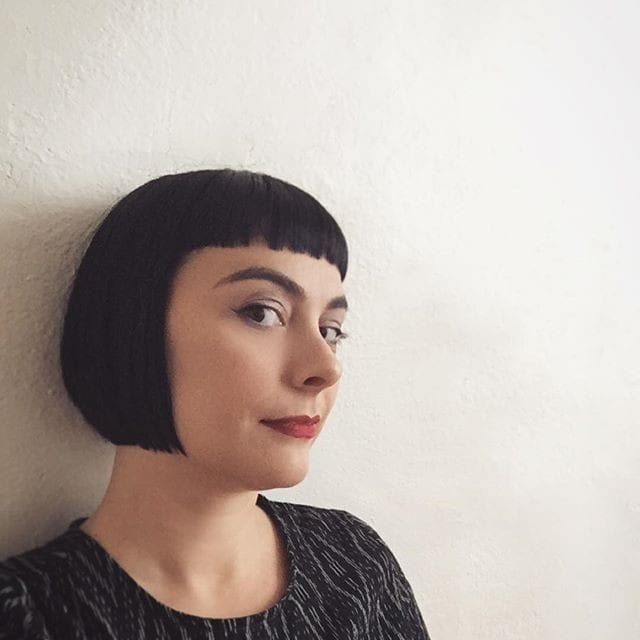 Chin-length short blunt bob with short blunt bangs