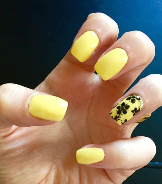 Lovely Yellow Nails with Black Flowers