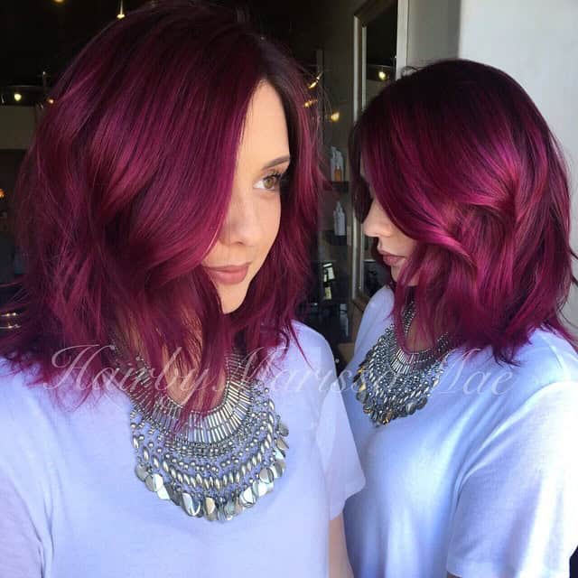 Wavy violet lob with long layers for thick hair