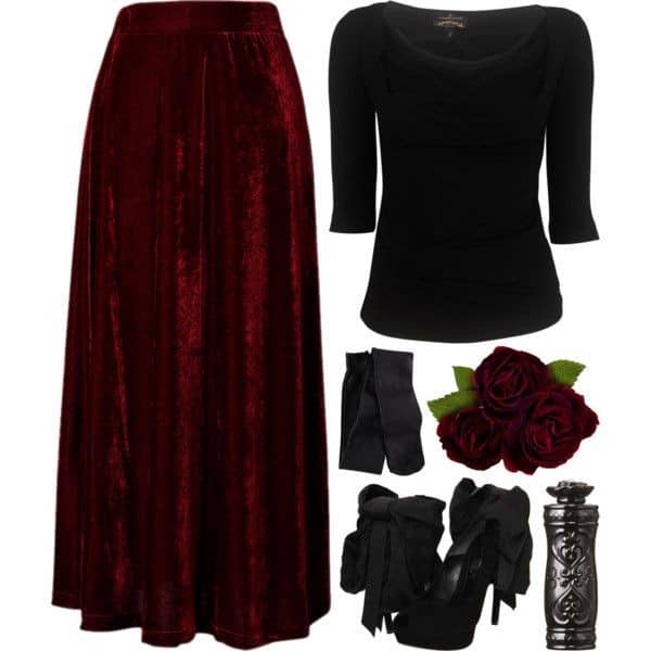 Black quarter-length top and crimson velvet maxi skirt