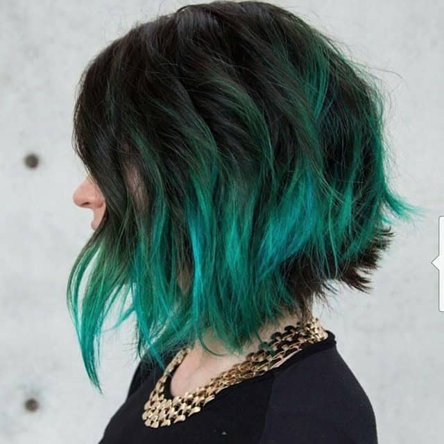 Messy black bob with dark green ends